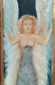 Auf dem Bild ist ein Engel mit orange-rötlichem Haar und fast freier Brust zu erkennen.
